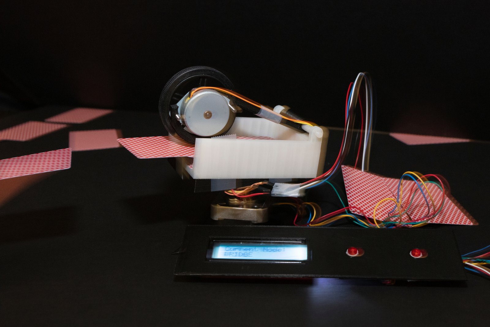 Robot card dealer prototype with stepper motor mechanism dealing playing cards